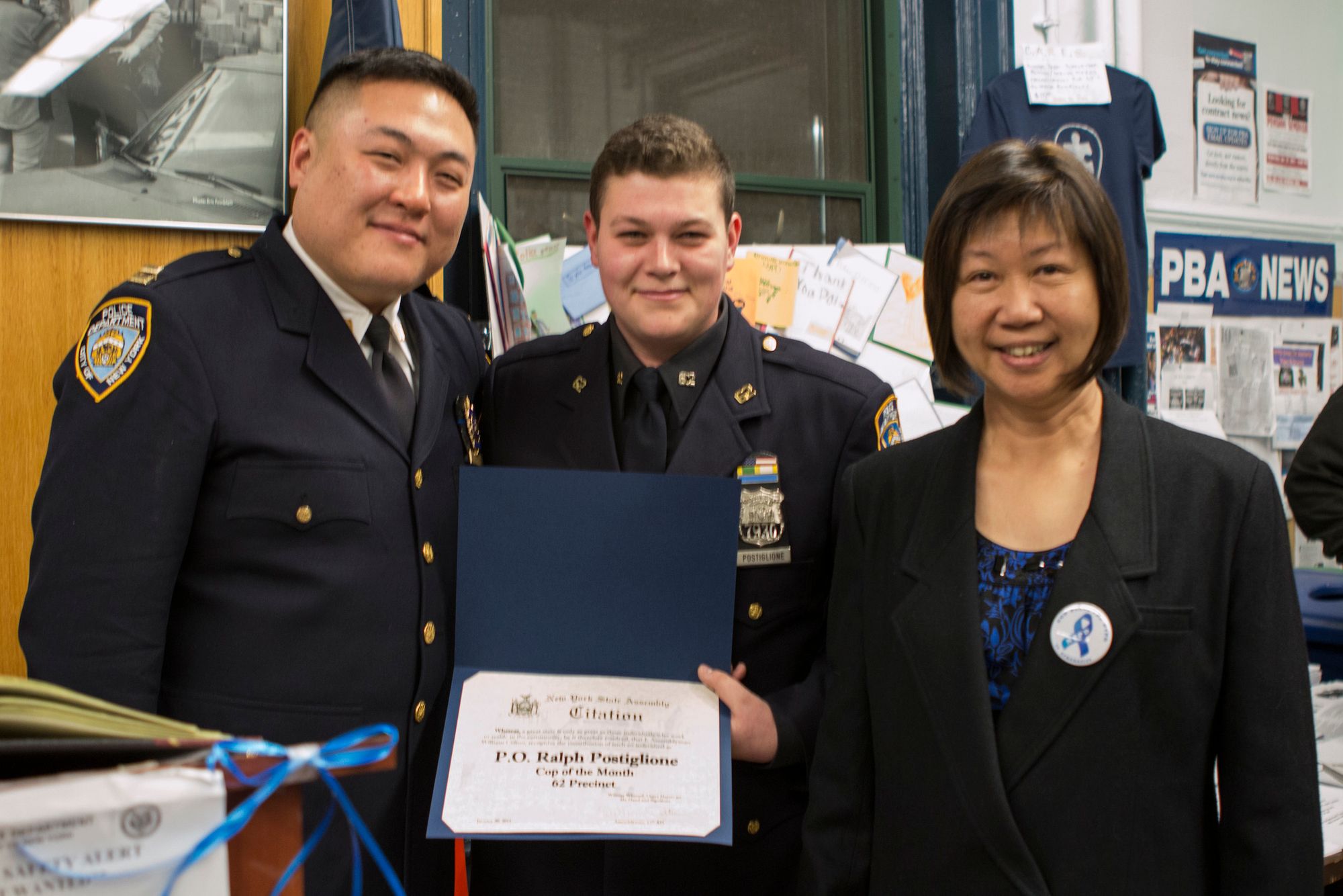 Captain Chen, Officer Postiglione, Democratic District Leader Nancy Tong (Photo by Kimberly Connor)