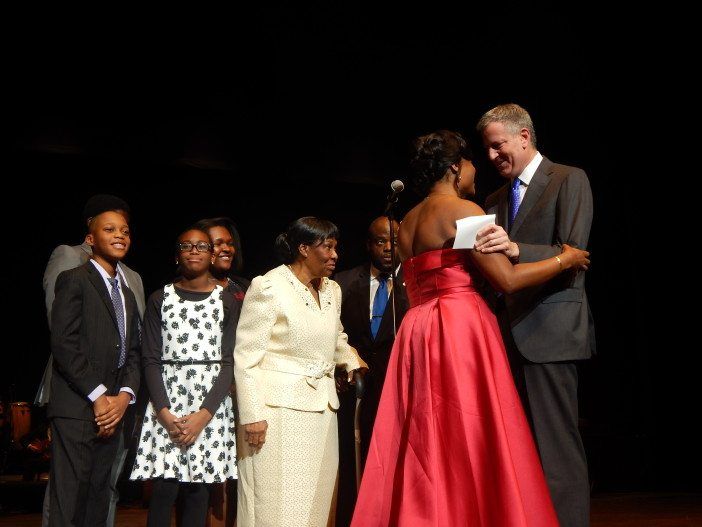 Assemblywoman Rodneyse Bichotte with Mayor Bill de Blasio and her family following the swearing-in.
