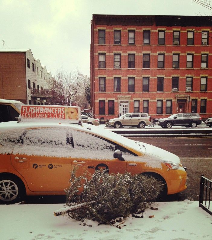 cab and christmas tree on 4th ave