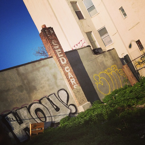 lyceum lot, used cars ghost sign