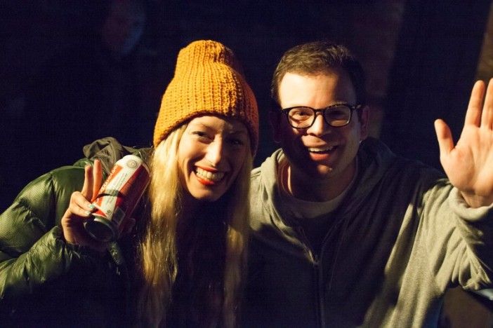 Adam Wade, a fan, and a fan's free beer during one of Adam's performances at  Under St. Mark's. Photo via Adam Wade.