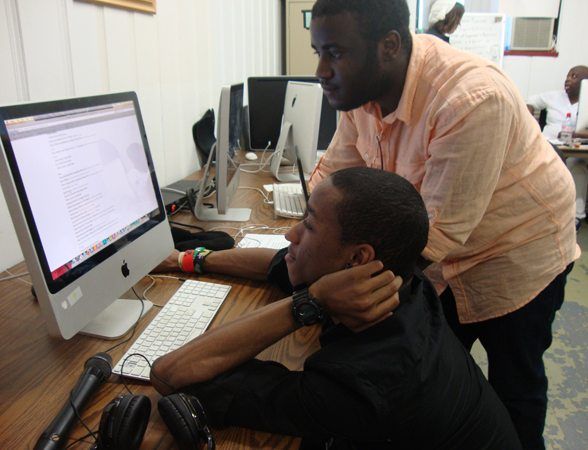 DaQuan Herring and Evan Jackson work on videos as part of the Youth Made Media program. (Photo by Brandan Sandy.)