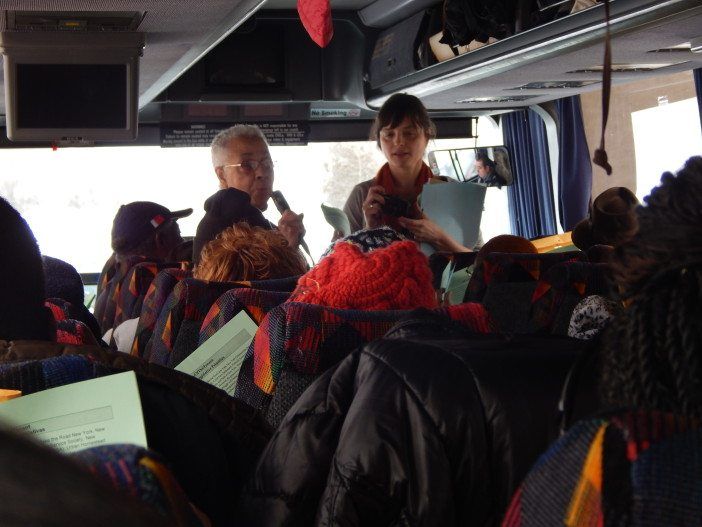 Flatbush Tenant Coalition member Jean Folkes speaks about affordable housing on the bus to Albany.