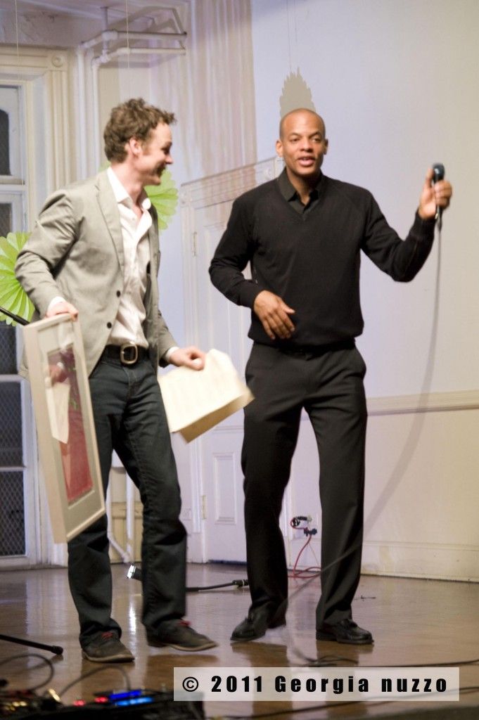 Parents Timothy Johnstone and Dean Moodie acting as auctioneers at a recent Greene Affair.  (Photo courtesy of Greene Hill School.)