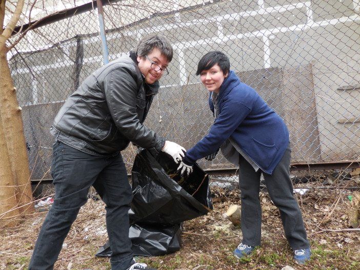 Neighbors Seth and Dina lend a hand. Photo by Nathan Thompson