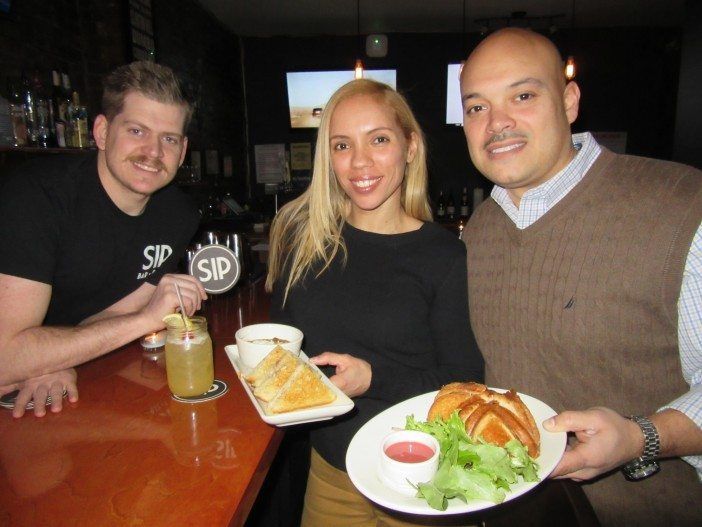 Francisco and Erica Gil, right, and bartender Tyler at SIP Bar.