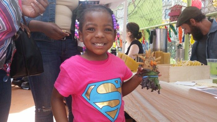 Victoria Williams, 4, and her potato named Ears, enjoyed the Earth Day festivities.