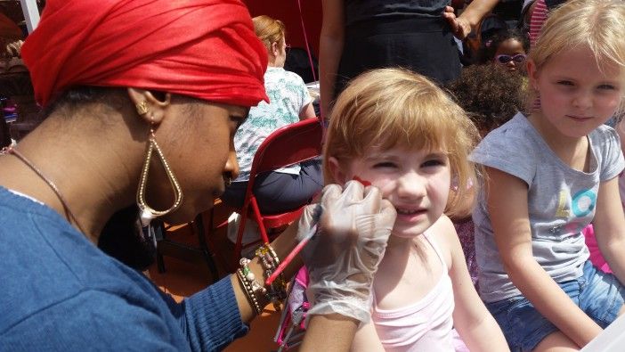 Magnolia, four, got her face painted by local business Fruiggie, at the Earth Day Expo.