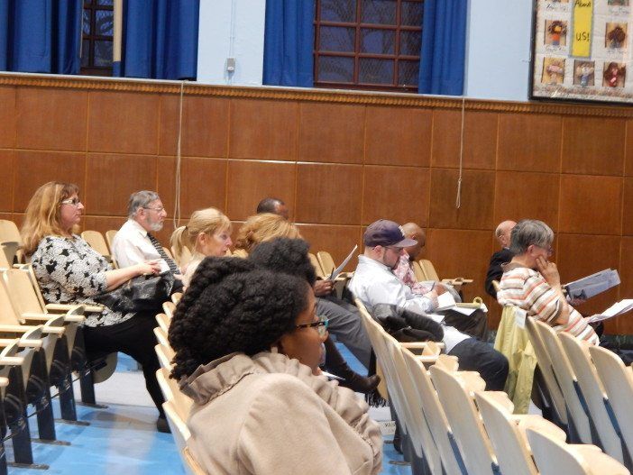 Neighbors attend Monday night's CB 14 meeting.