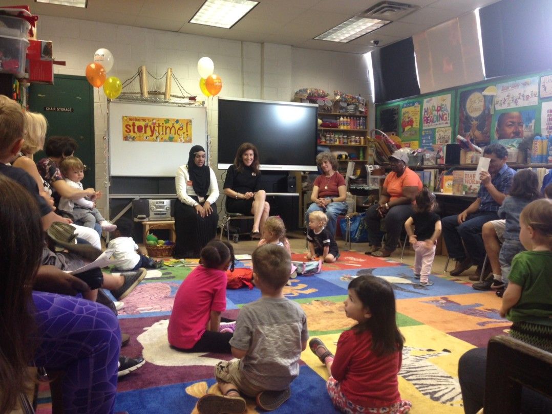 Brooklyn Public Library President Linda Johnson spends time with children attending the Windsor Terrace Library's popular story time Monday. Photo courtesy the Brooklyn Public Library.