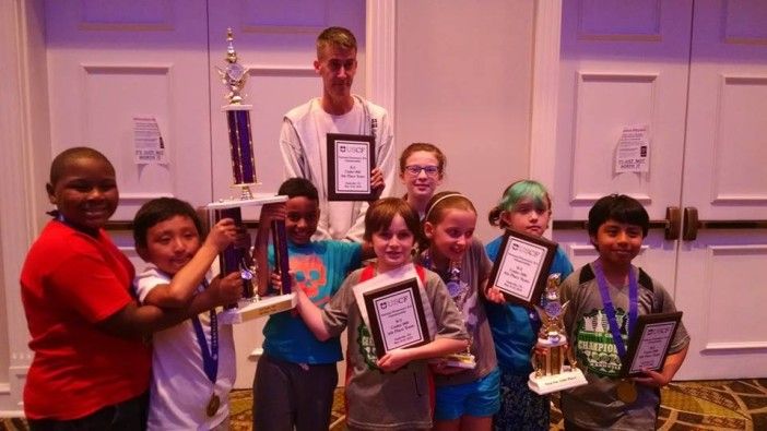 (Left to right) Brian Thevenot, Sonam Sherpa , Alexander Pierre Joy, Ian West, Ryan Reddish, Ariana Winawer-Stein,  Aowyn Schneider, Vivian Gore, and Emmet Duprey. Photo courtesy PS 139 Chess Ninjas.