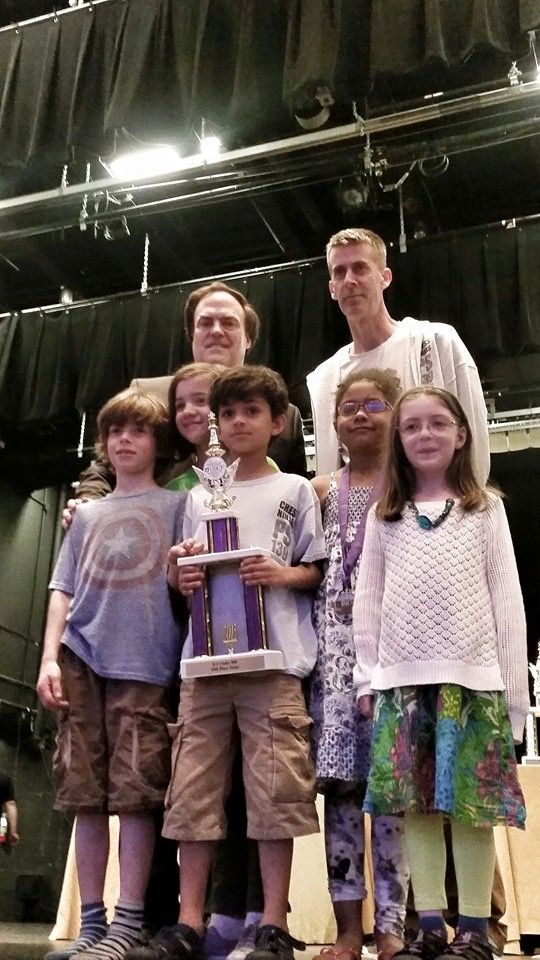 (From left to right) Neven Swanson, Bea Rush, Declan Seignoret-Lutton, Maya Emert-Wiggins, Polly Morrow, and (back row) Ian West. Not pictured: Emma Adams. Photo courtesy PS 139 Chess Ninjas