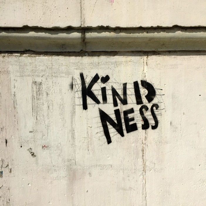 graffiti reading "kindness" in park slope, brooklyn