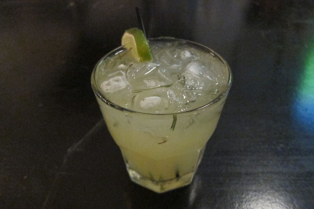 A delicious margarita rosarito with fresh rosemary and lime juice.