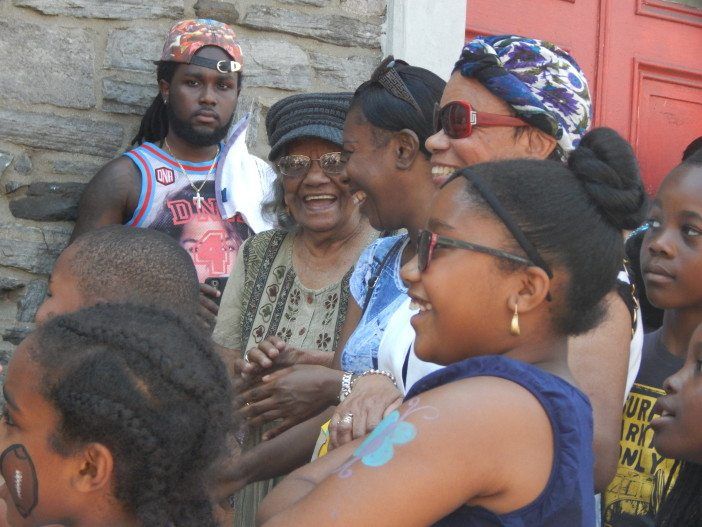 Flatbush Avenue Street Fair crowd watches the magician 2