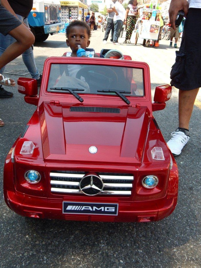 Flatbush Avenue Street Fair kid in a car