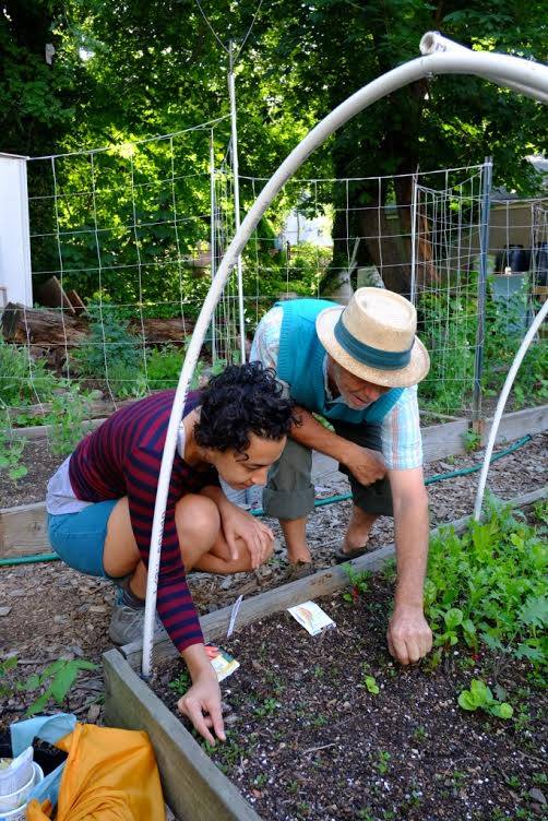 Neighbors working at the Flatbush Community Garden. Photo via the garden