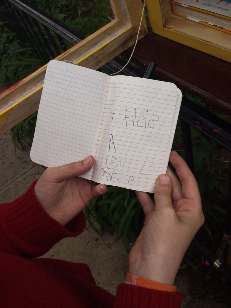 Neighbors can leave notes, like this one, in the Little Free Library.