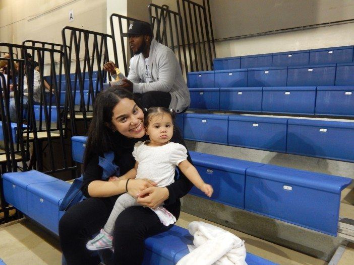 Amy Valentine brought her daughter Brooke, 11 months, to the Paramount for her very first boxing match. (Photo by Michael Randazzo)