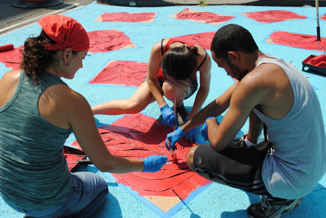 Artists work on one of the DOT's public art projects in Tribeca. Photo via the DOT