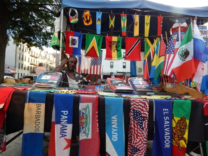 Selwyn Branker has been selling flags at the Flatbush Caton Market for 14 years.
