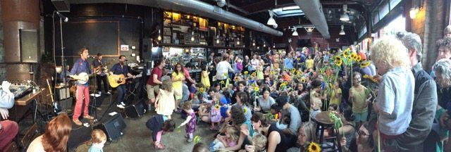 kids and parents at a concert at greenwood park in south slope