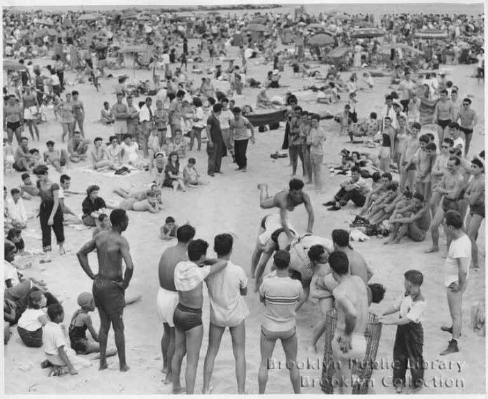 people on the coney island beach in 1953