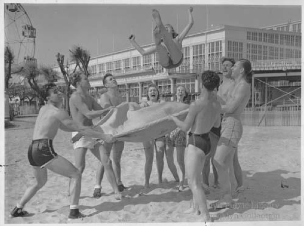 1950s blanket toss on coney island beach