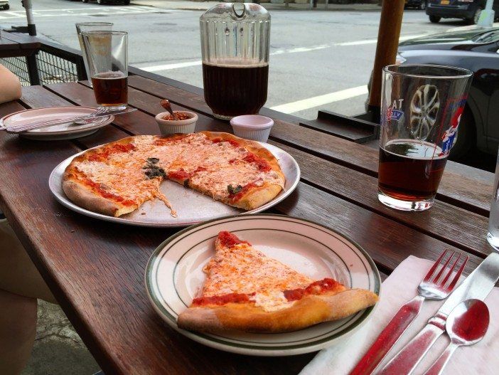 Pizza and beer outside at Toby's Public House in South Slope