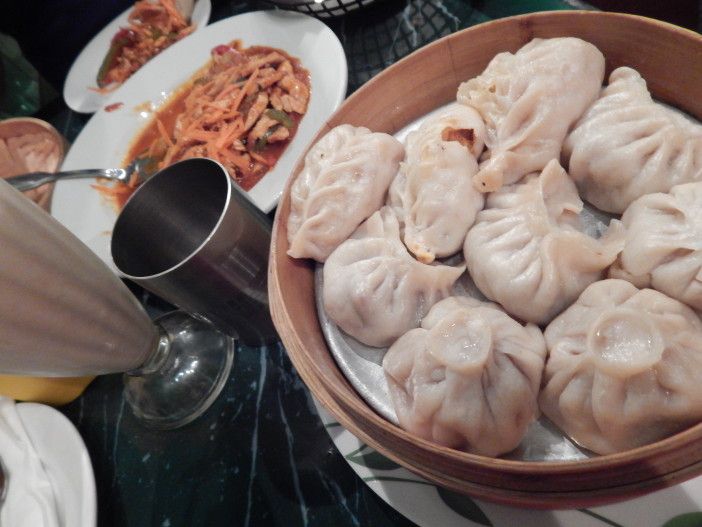 Momos and chicken with mango at Cafe Tibet.