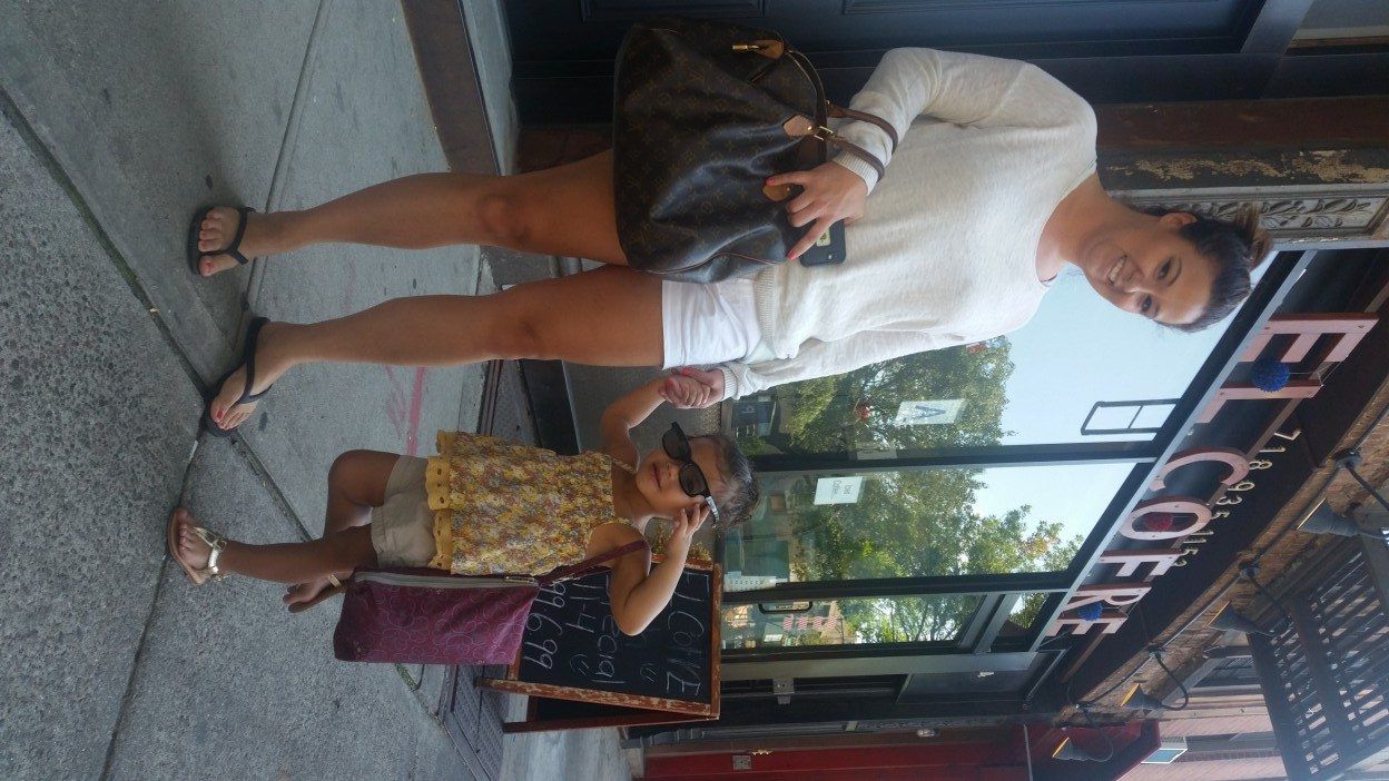 Little Suraya shows off her microfashion with mom Barbara on Myrtle Avenue. (Photo by Fort Greene Focus)