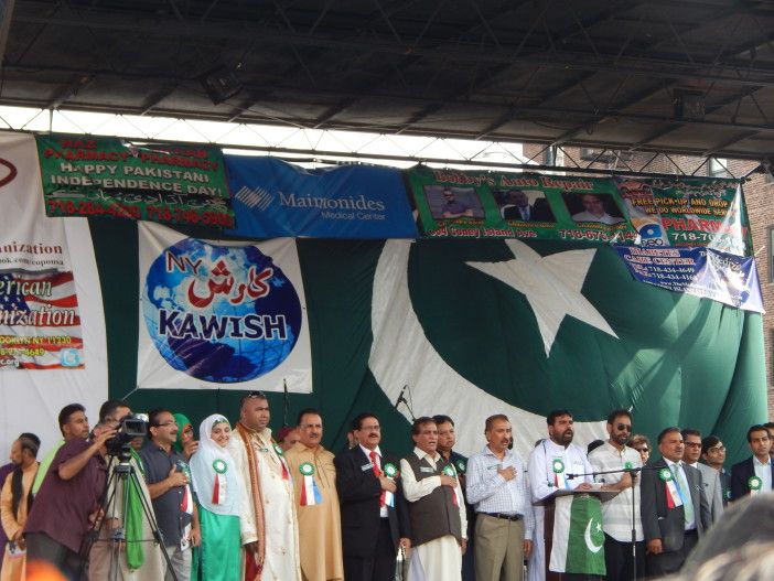 Pakistani and other community leaders gather on stage. Photo by Ditmas Park Corner