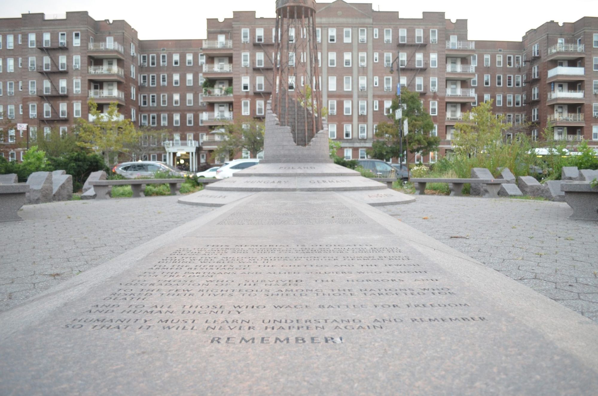 The inscription by Elie Wiesel beneath the eternal light at Holocaust Memorial Park.