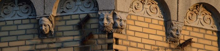 A series of Greek mythological gargoyles on West 5th and Kings Highway. (Photo by Daniel Frazer)