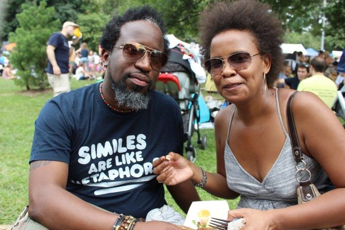 Robinson and Natalie Bridgewater stopped by to try the fried anchovies from Bon Chovie while on vacation from Washington DC. (Photo by Shannon Geis/Ditmas Park Corner)