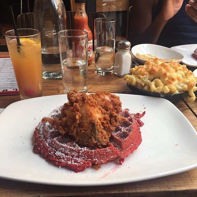 fried chicken on red velvet waffles at soco