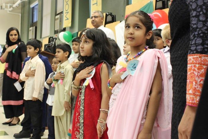 Students from the BRICK - Startalk Urdu Program recite the Pledge of Allegiance