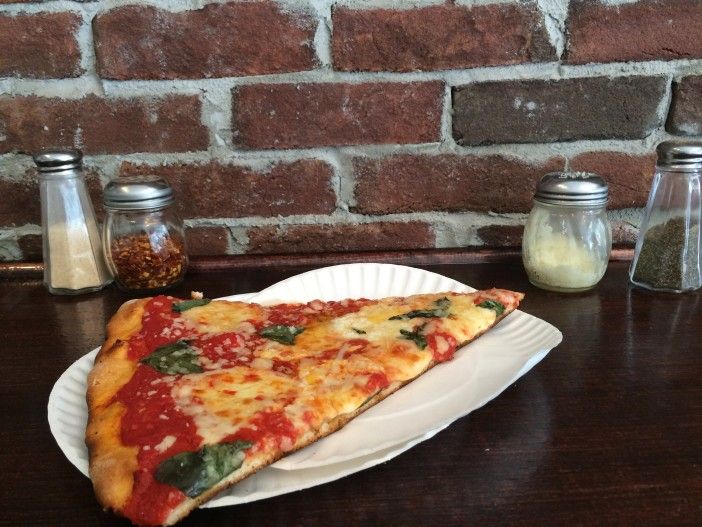 The Margherita Slice has tangy sauce, fresh basil, and a dark, crunchy crust (Photo by Park Slope Stoop)