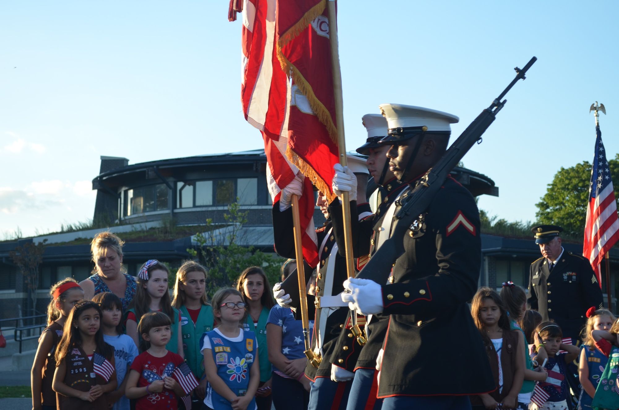 The United States Marine Core Battalion Six Color Guard at the 9/11 memorial service in Marine Park.