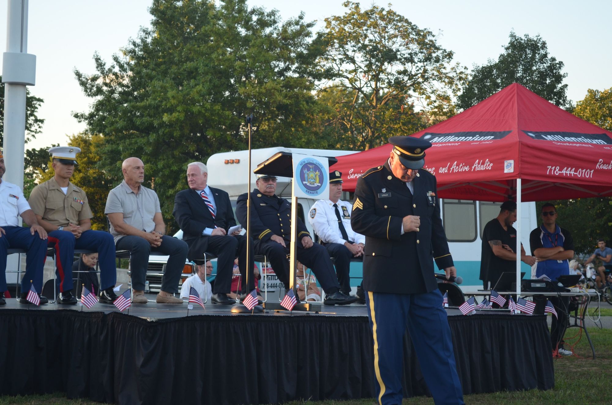 Retired police sergeant Louis Licalzi about to lead a song. 