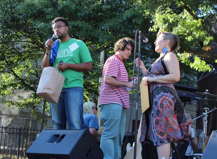 Anthony Finkel of the Flatbush Development Corporation announcing raffle winners at the Flatbush Frolic. (Photo by Shannon Geis/Ditmas Park Corner)