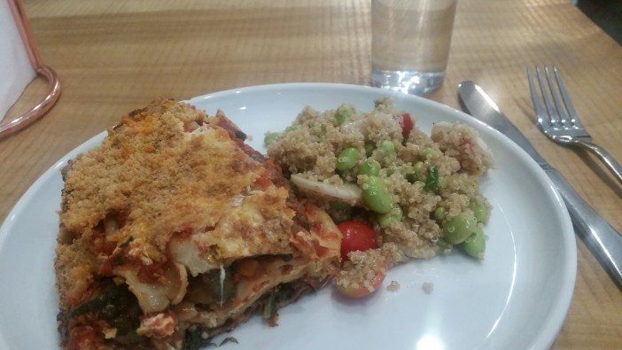 The summer vegetable lasagna with a side of quinoa-edamame-tomato-radish salad. (Photo by Heather Chin / Fort Greene Focus)