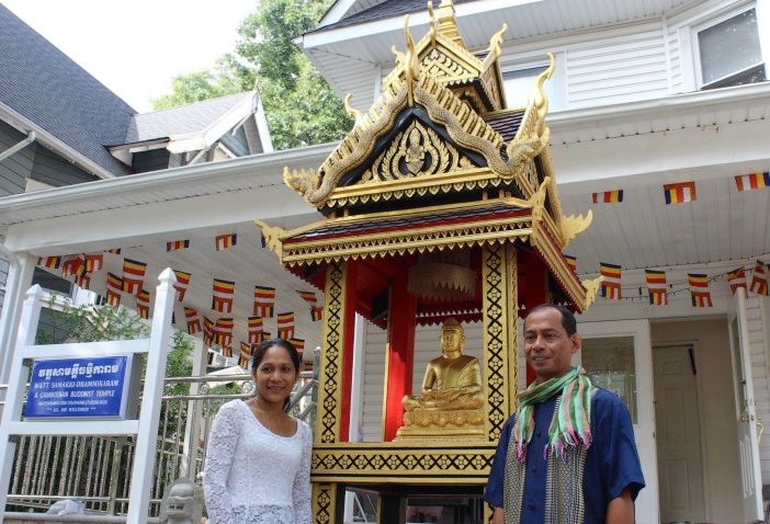Savath Chan with the pagoda he built. (Photo by Shannon Geis/Ditmas Park Corner)
