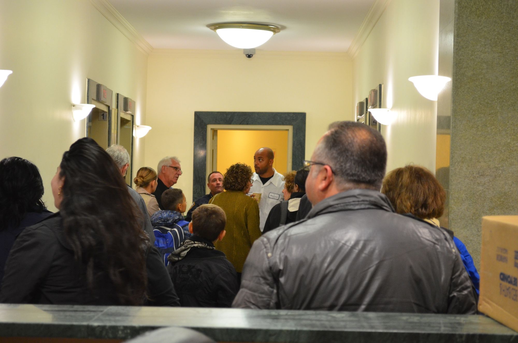 Residents waiting for the elevators after the building reopened. (Photo: Alex Ellefson / Sheepshead Bites)