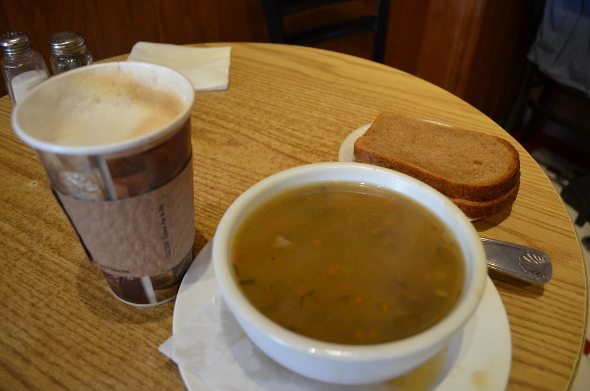 A latte with mushroom and barley soup. 