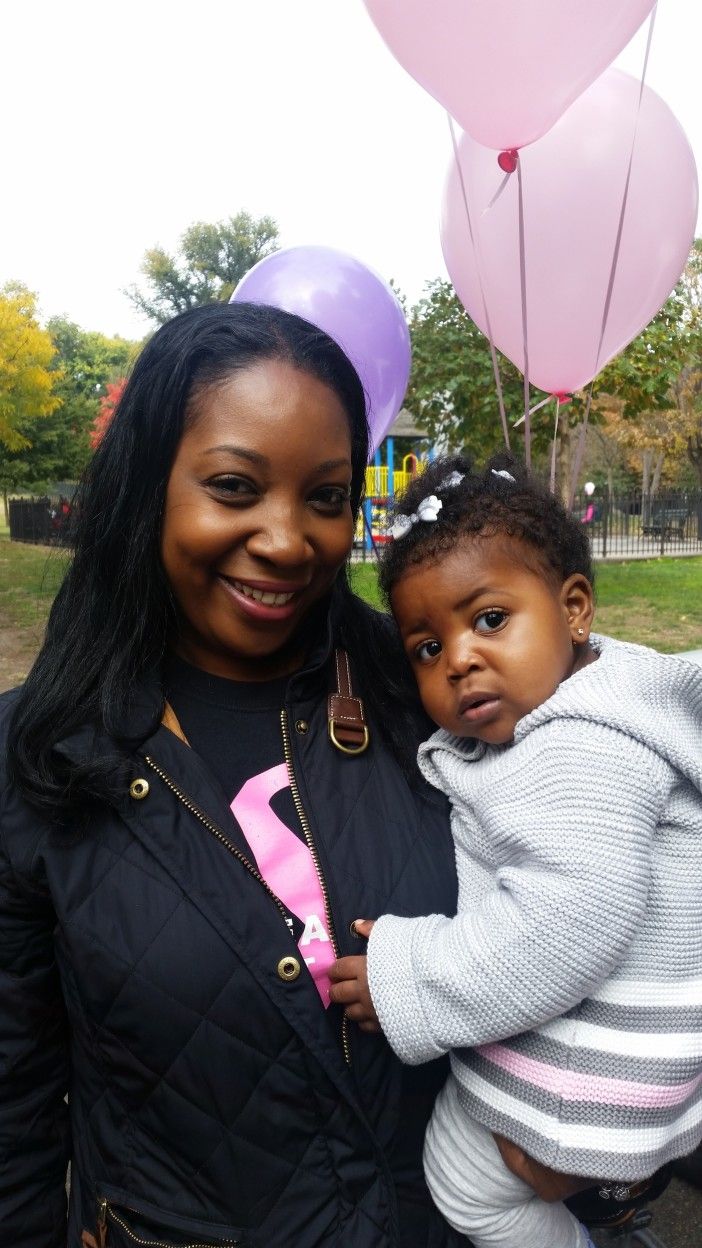 Sergeant Annette Perry of the 88th Precinct and her daughter, Laila. (Photo by Fort Greene Focus)