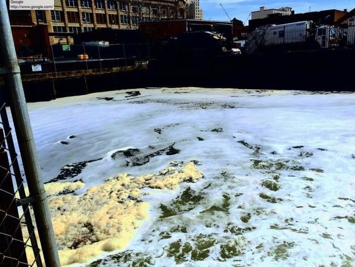 Christopher Swain swims Gowanus