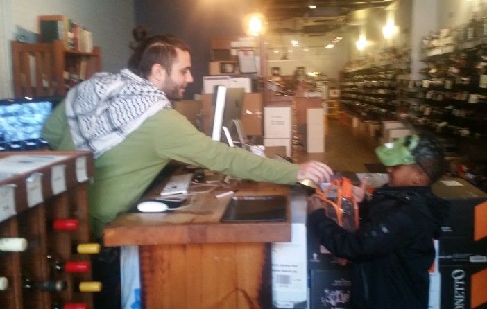 Businesses got in on the trick or treat action, like here at Gnarly Vines. (Photo by Fort Greene Focus)