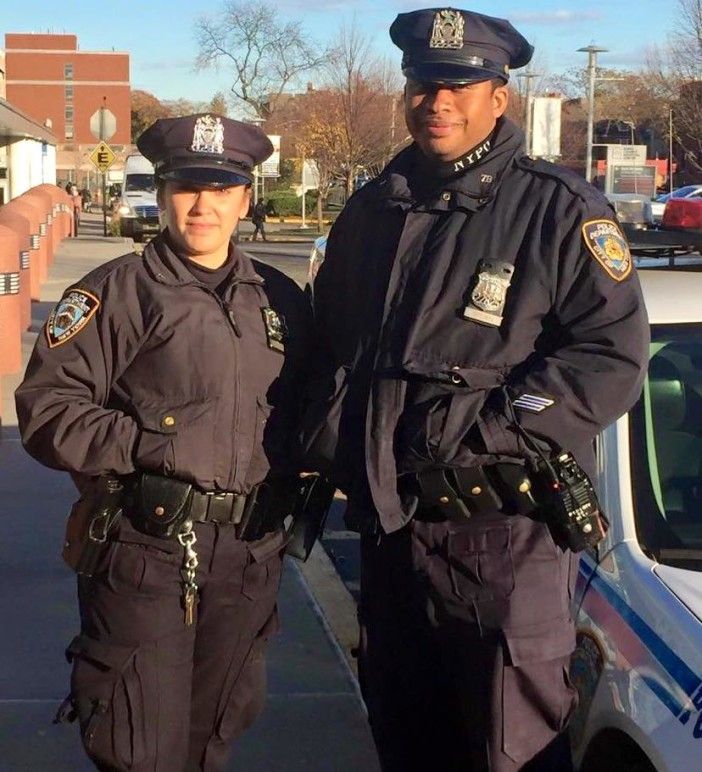 Police Officers Brown and Cordero delivered a baby Monday. (Photo via NYPD)
