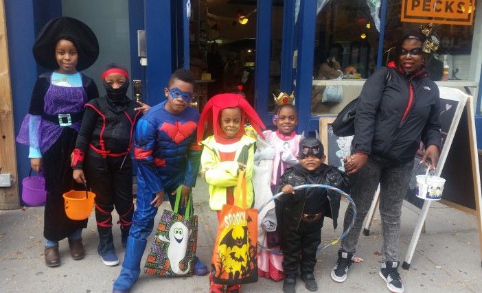 The Andersen and Duncan families out trick-or-treating. (Photo by Fort Greene Focus)